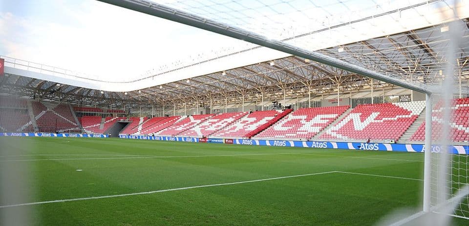 View of empty stadium with goalpost and grass pitch