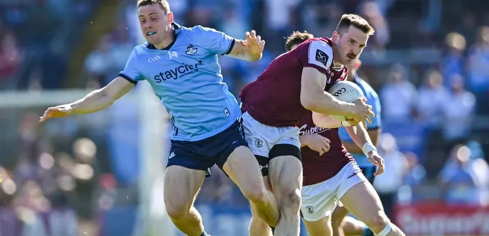 Player tackling opponent while running with the ball