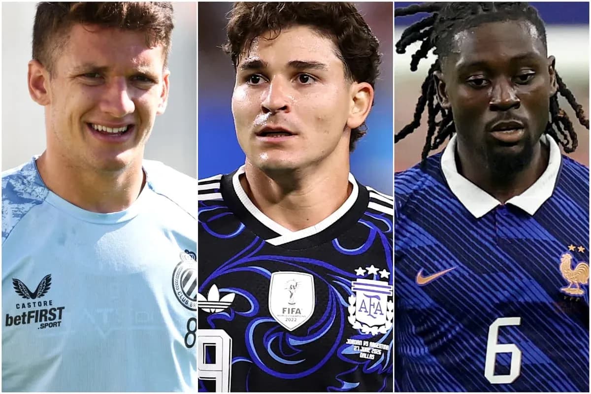 Three soccer players in team jerseys, facing camera