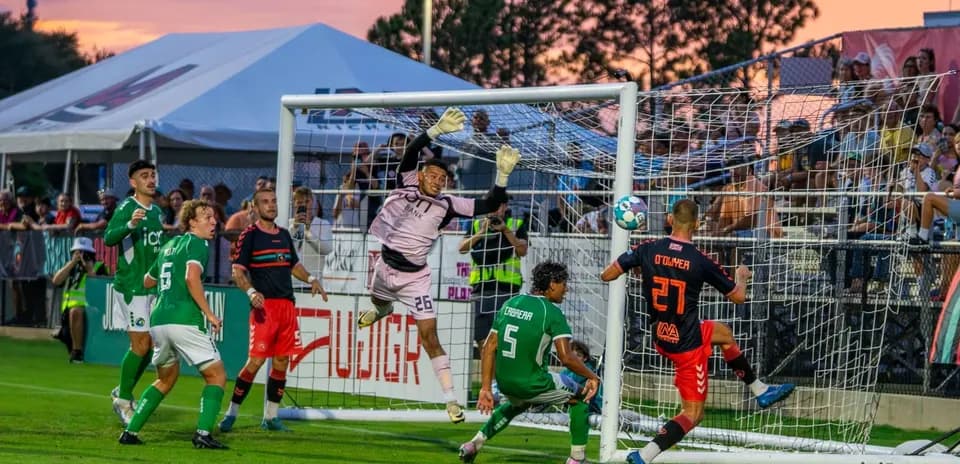 Goalkeeper saving a shot during Indy Eleven match