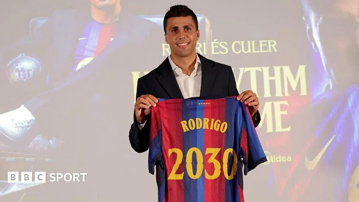 Player holding Barcelona jersey with name Rodrigo and number 2030