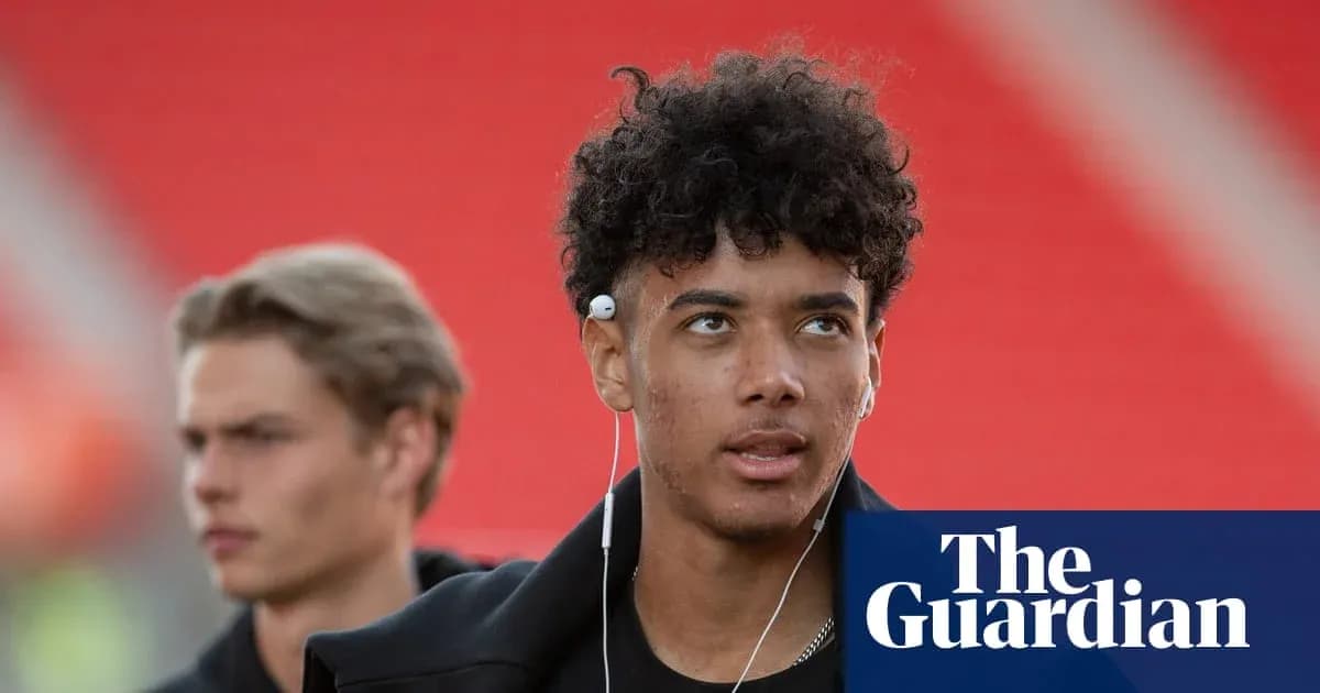 Young player wearing headphones walking before match