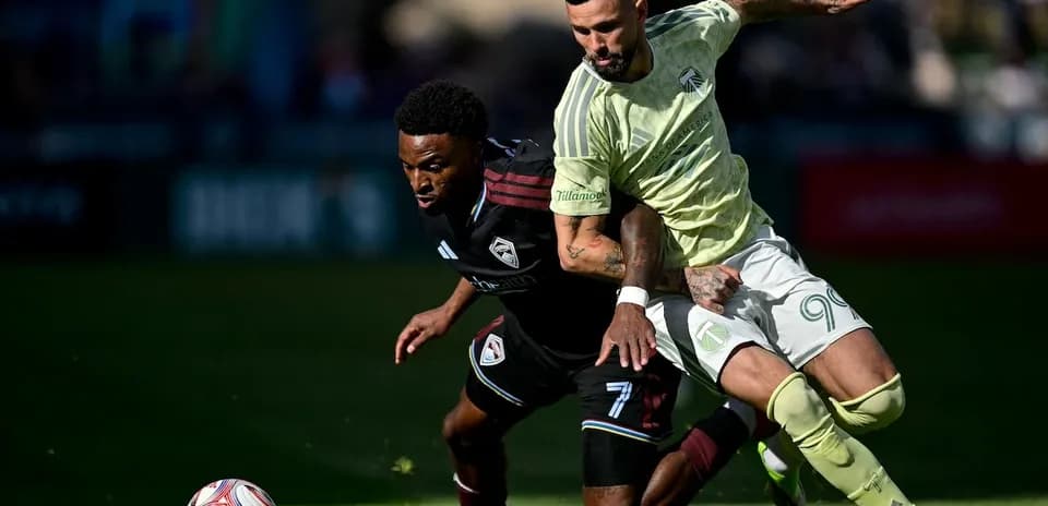 Player tackling opponent during Colorado Rapids II match