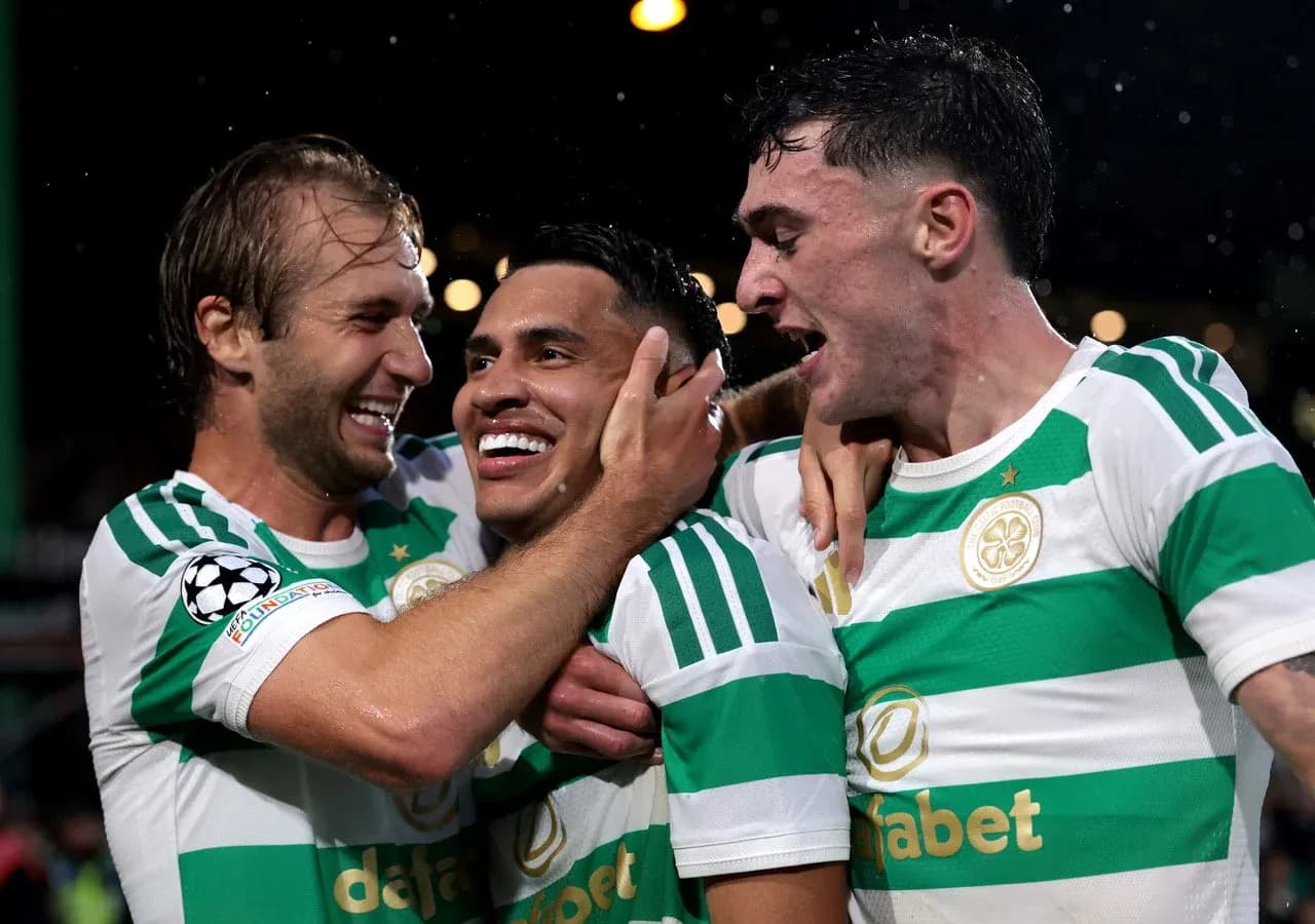Celtic players celebrating a goal during match