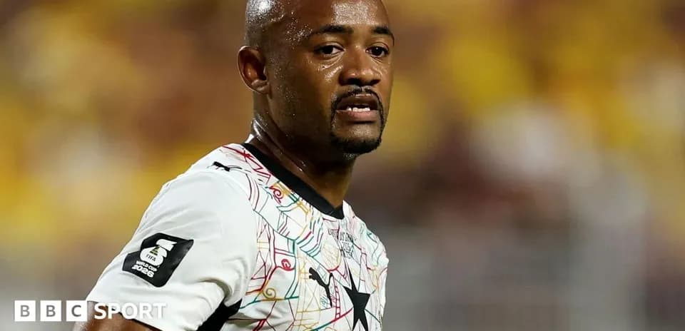 Ghanaian player during a match, wearing team jersey