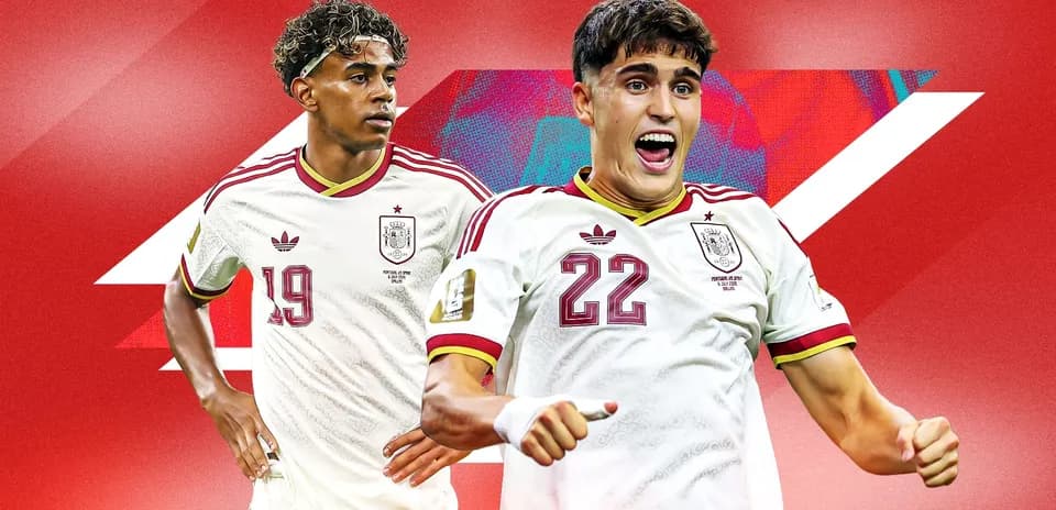 Two Spanish football players in national team jerseys