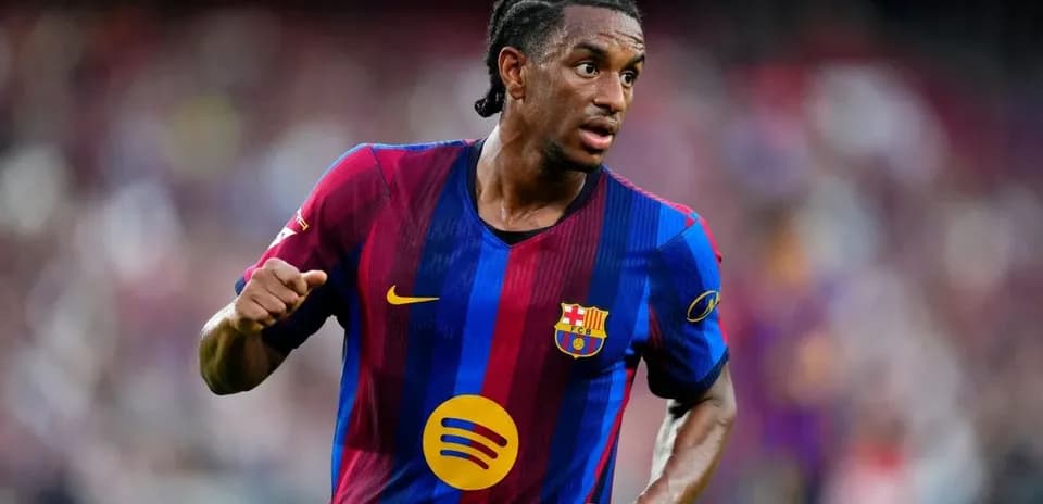 Player running on the field in FC Barcelona kit