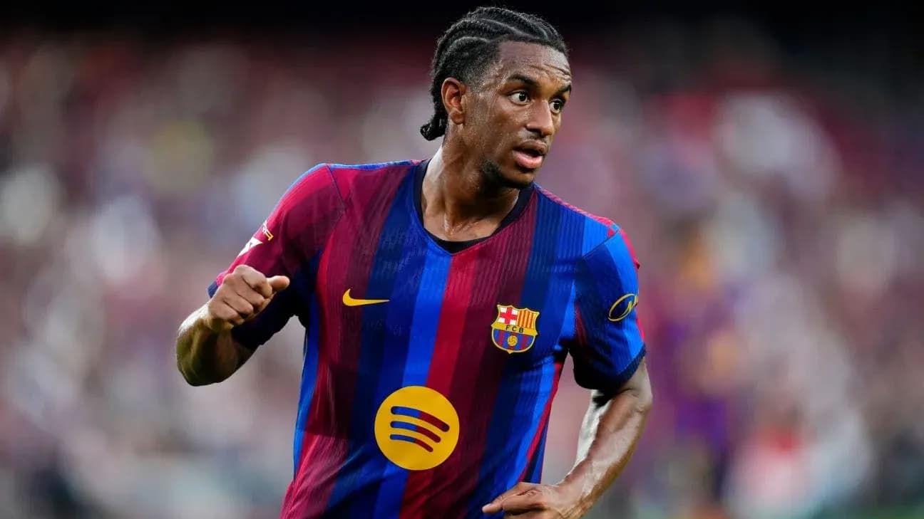 Player running on the field in FC Barcelona kit