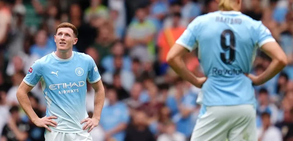 Two Manchester City players during a match