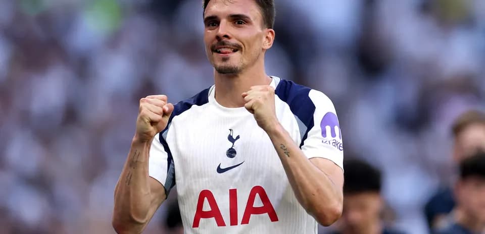 Tottenham player celebrating victory during match