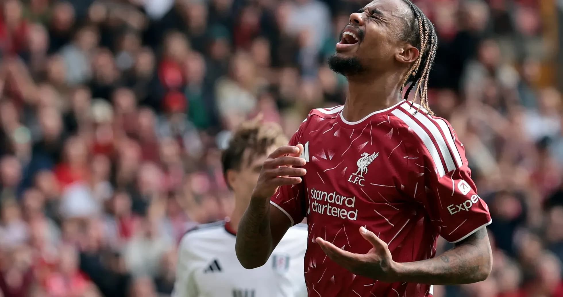 Liverpool player reacting during match against Fulham