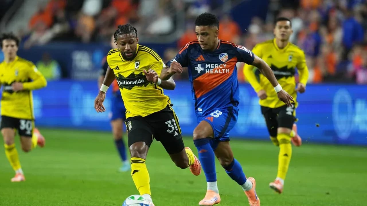 Players competing for the ball in MLS Next Pro