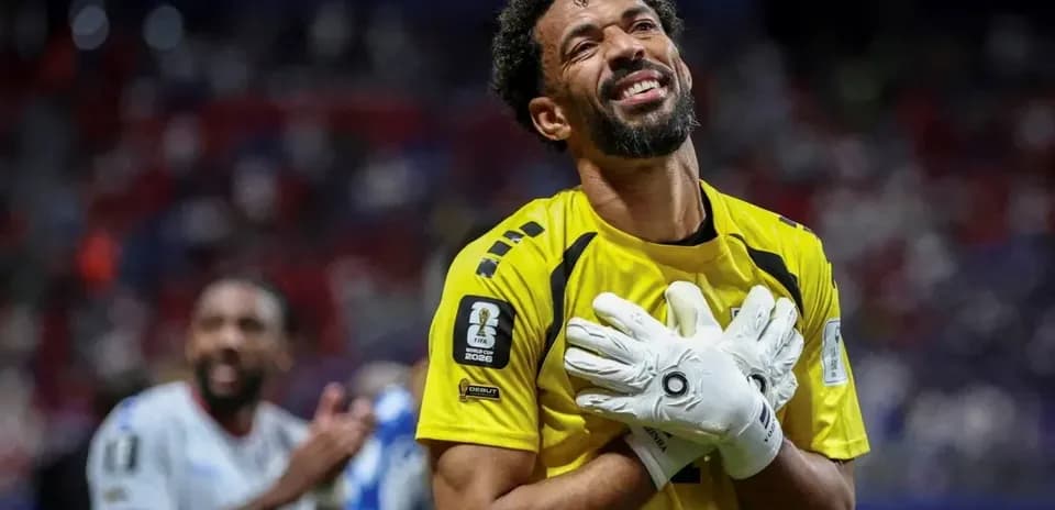 Goalkeeper celebrating after match with teammates