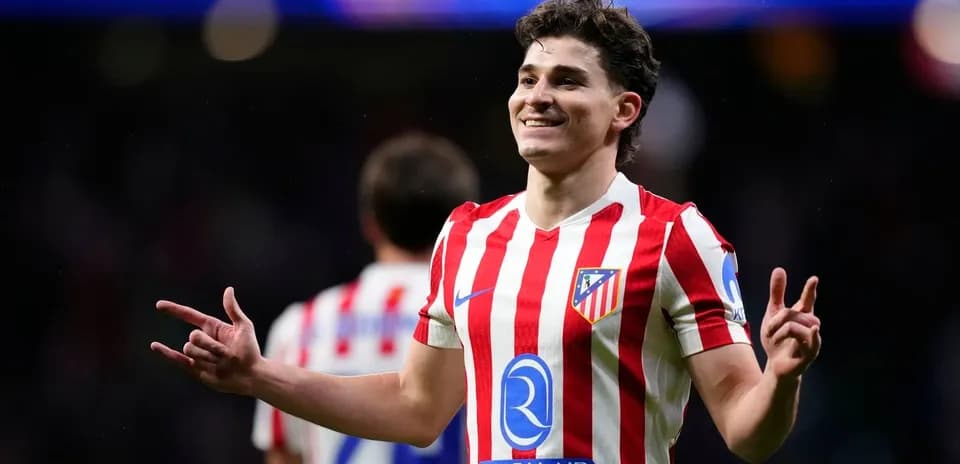 Atletico Madrid player celebrating on the field