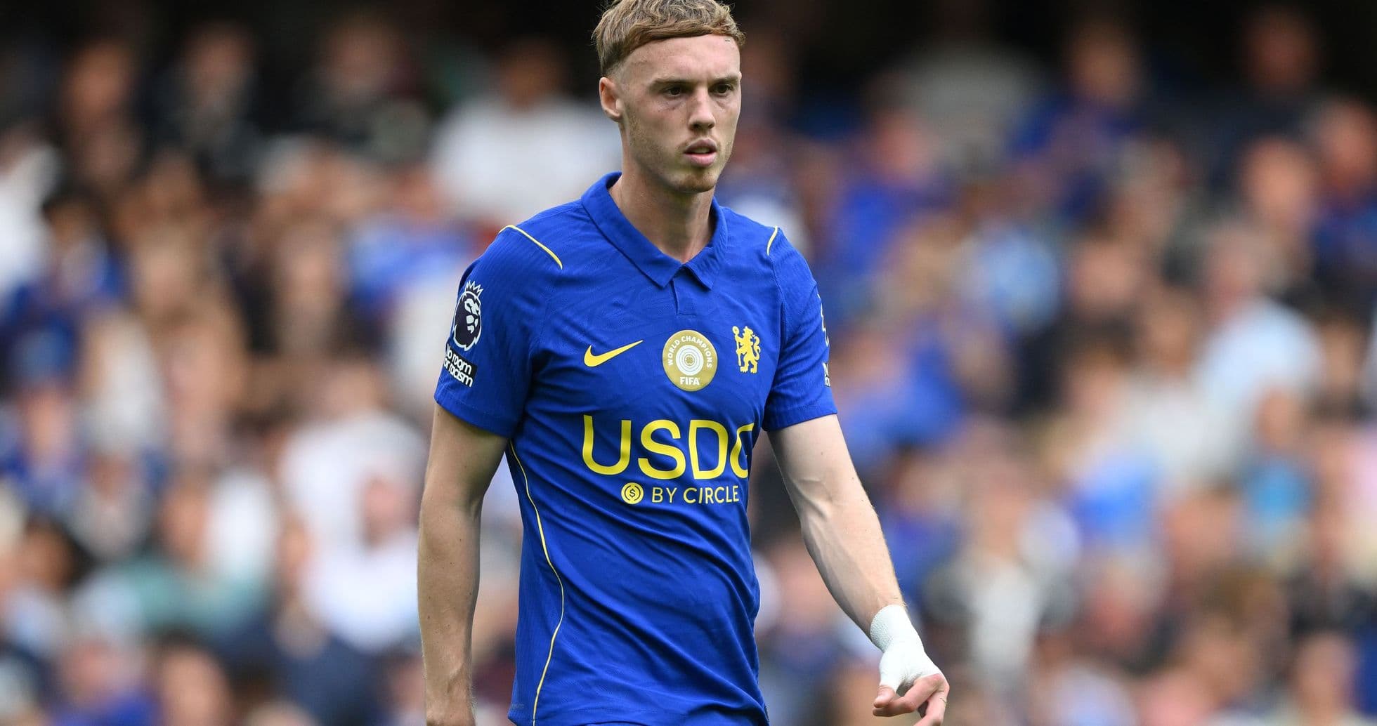 Chelsea player walking on the pitch during match