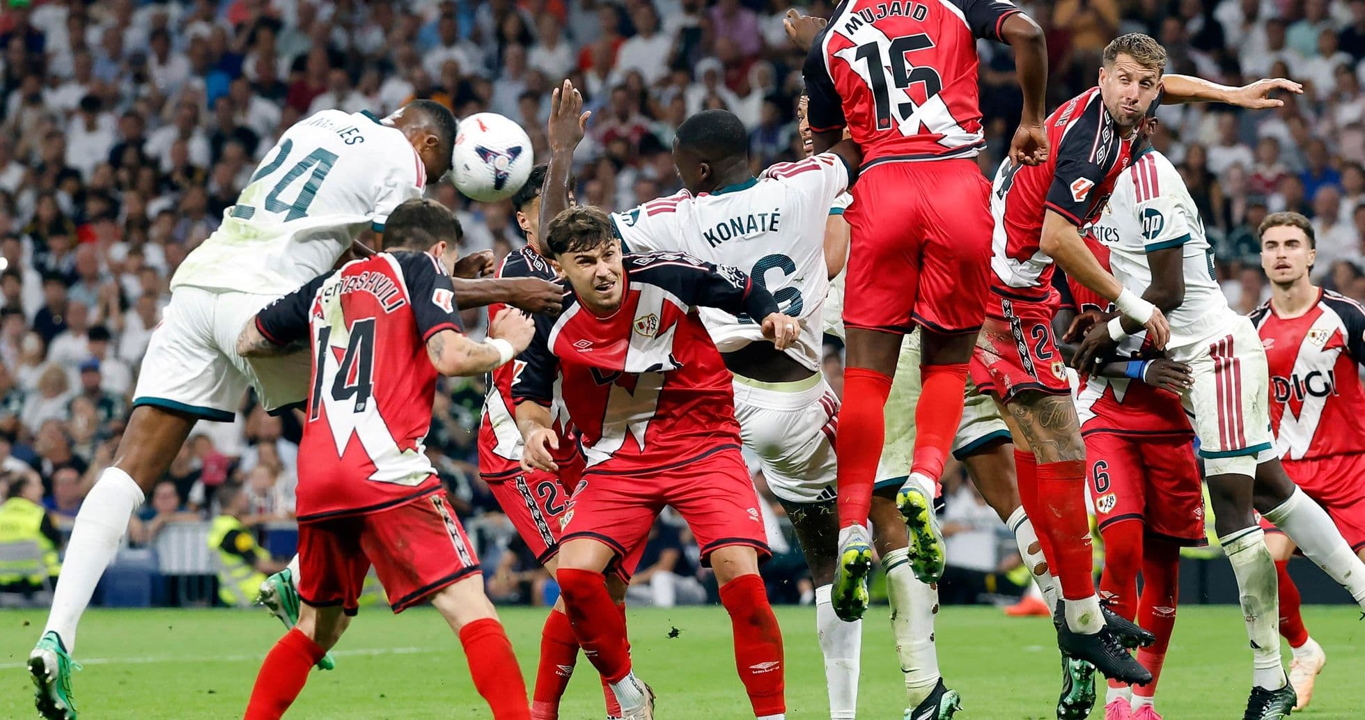 Players contesting for the ball during La Liga match