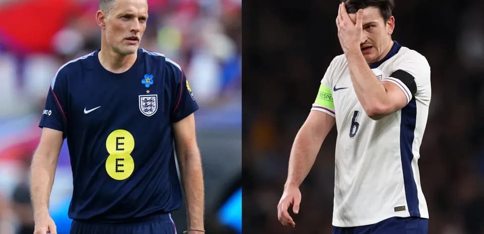 England team members during a match, one in kit