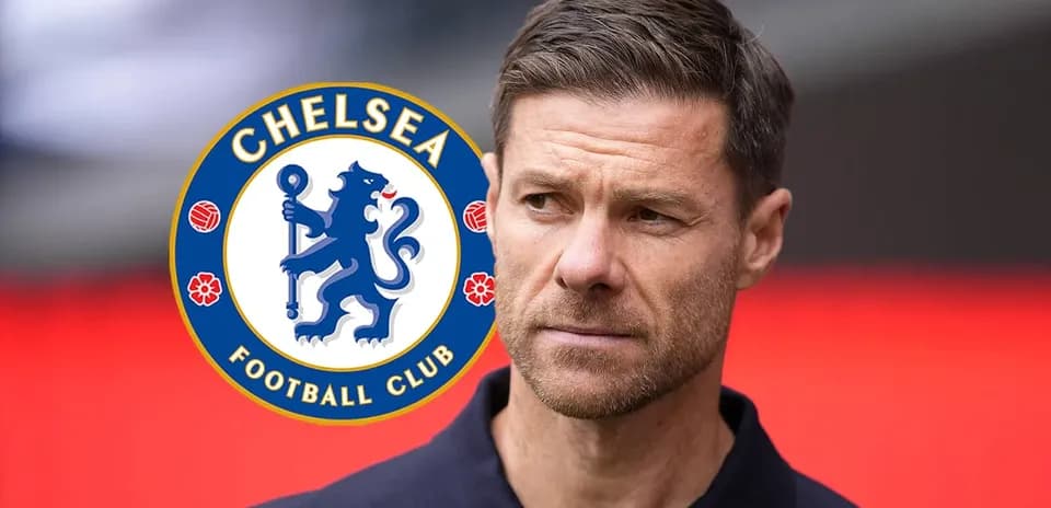 Coach with Chelsea FC logo in background