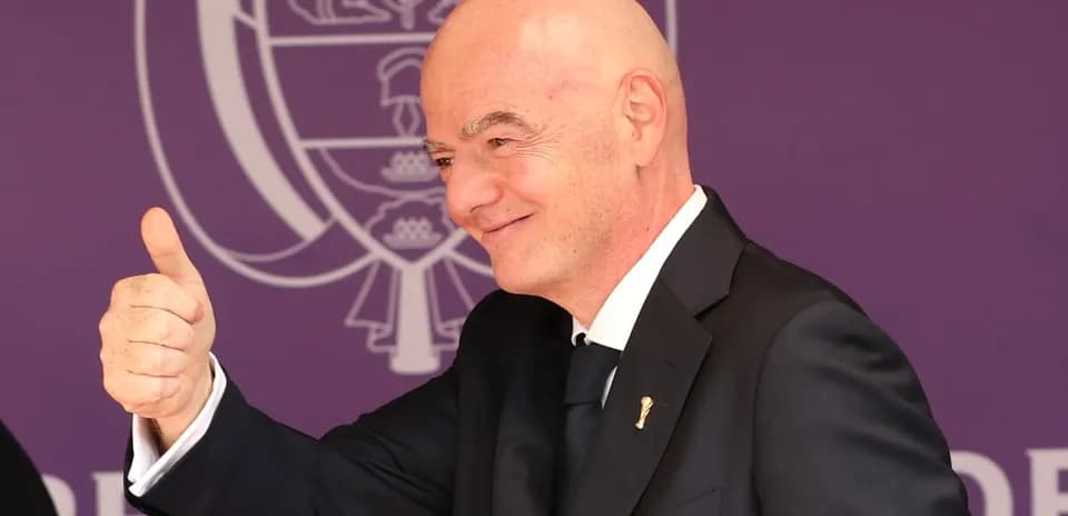 Man giving a thumbs up at event