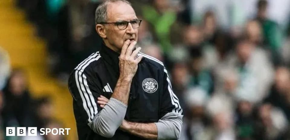 Coach observing match from the sidelines