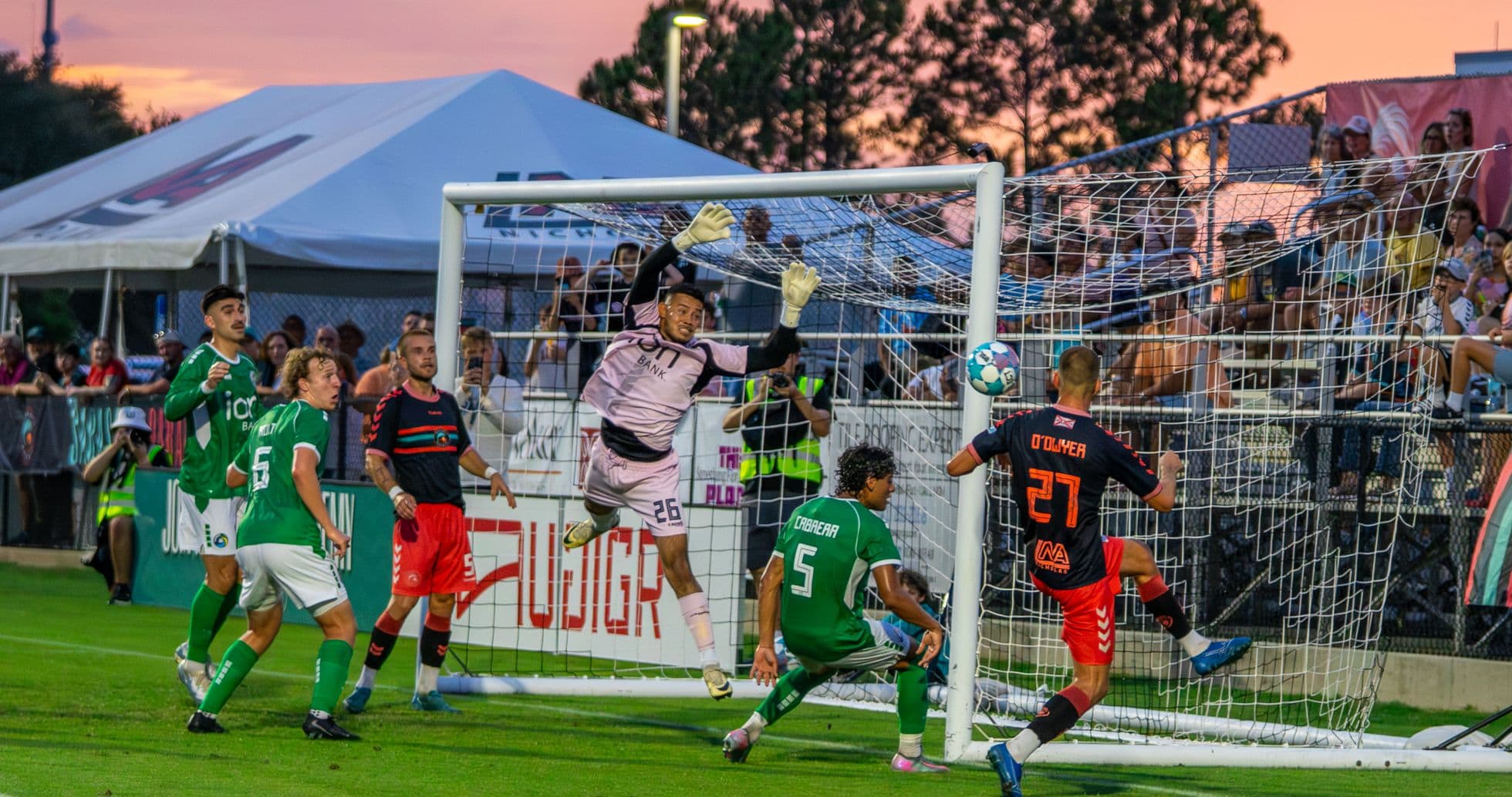 Goalkeeper making a save during Naples match