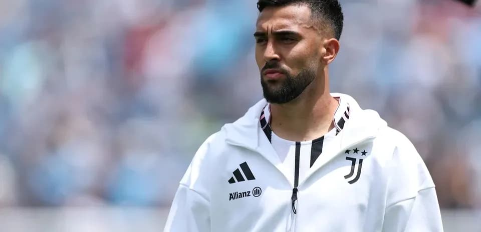 Player in Juventus tracksuit on the field