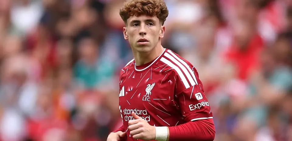 Player in red Liverpool kit on the pitch