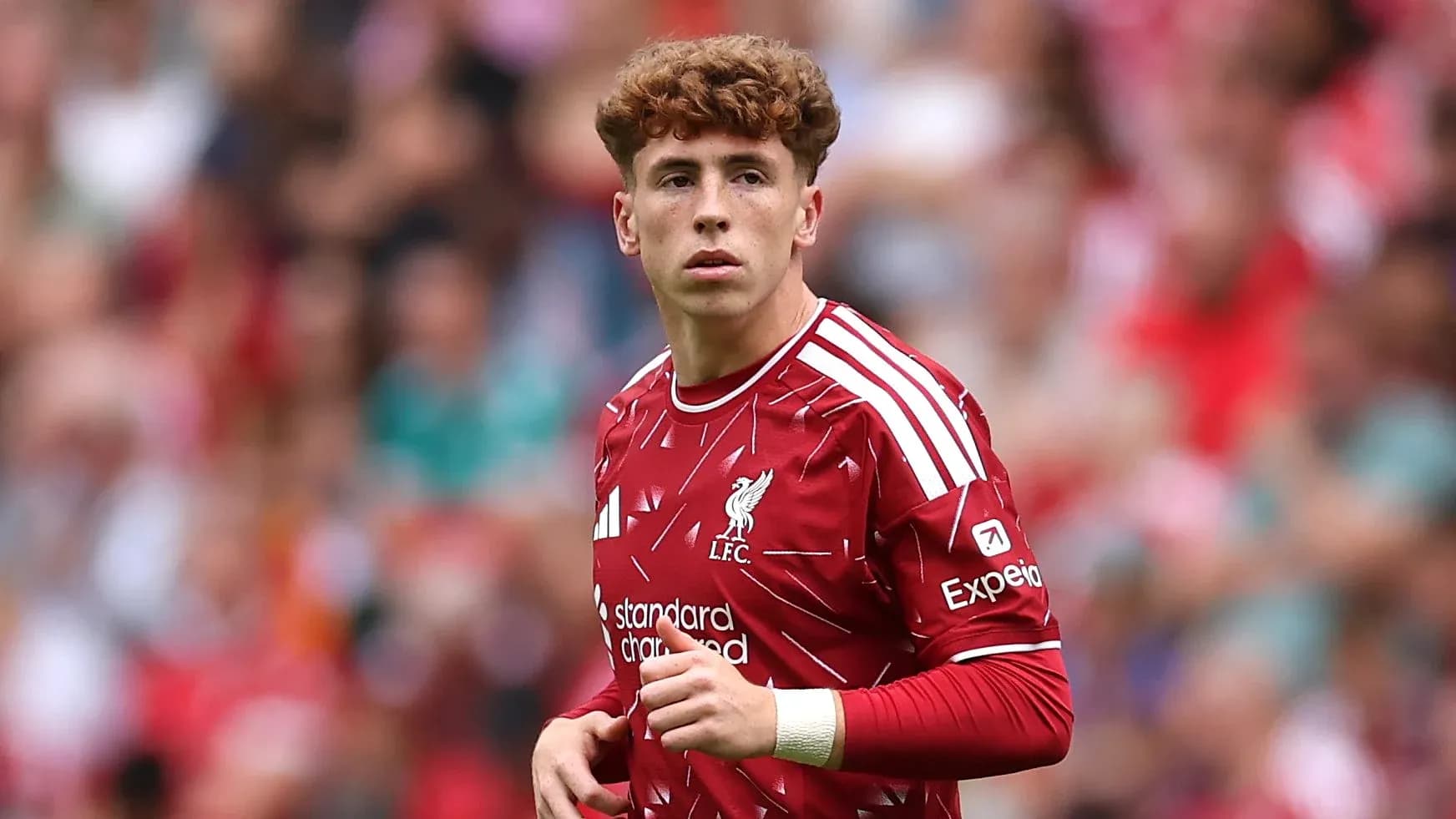 Player in red Liverpool kit on the pitch