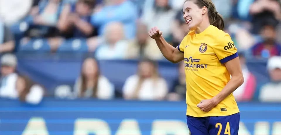 Player celebrating during NWSL match