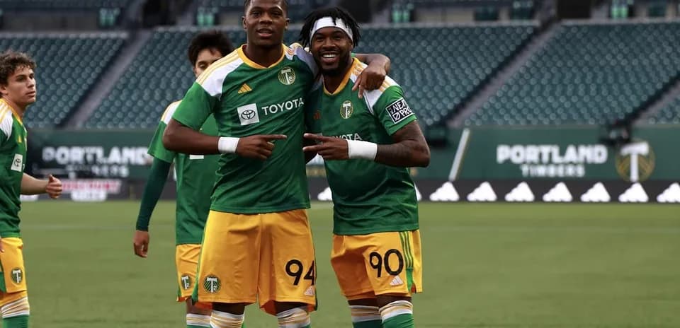 Players celebrating during Portland Timbers II match