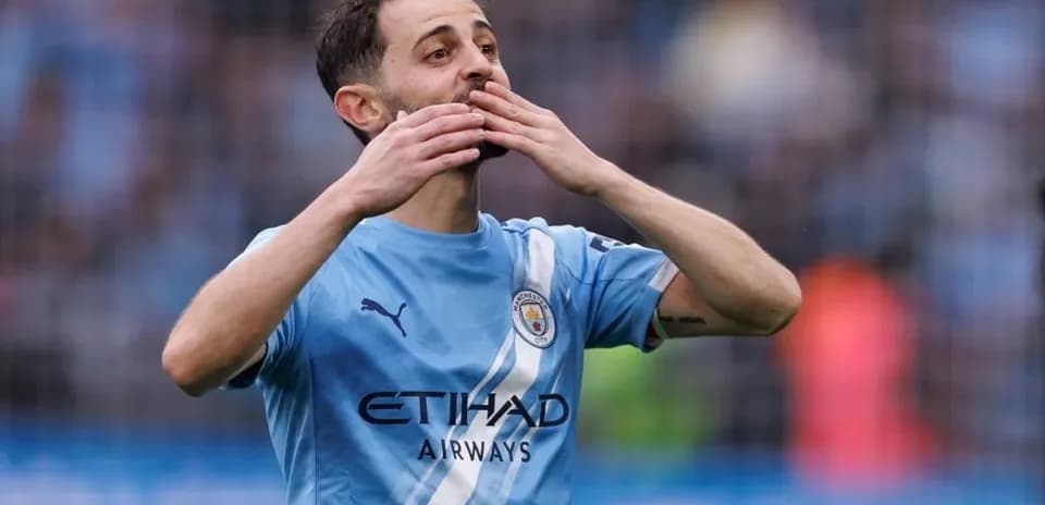 Player celebrating with hand gesture on field