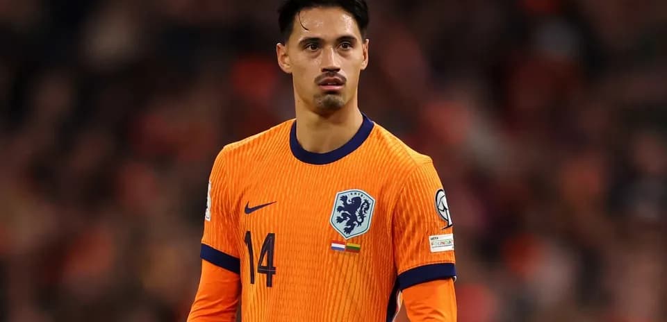Player in orange jersey during a football match