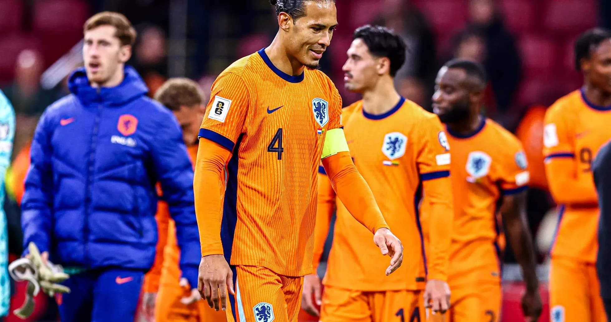 Netherlands players leaving the pitch after match