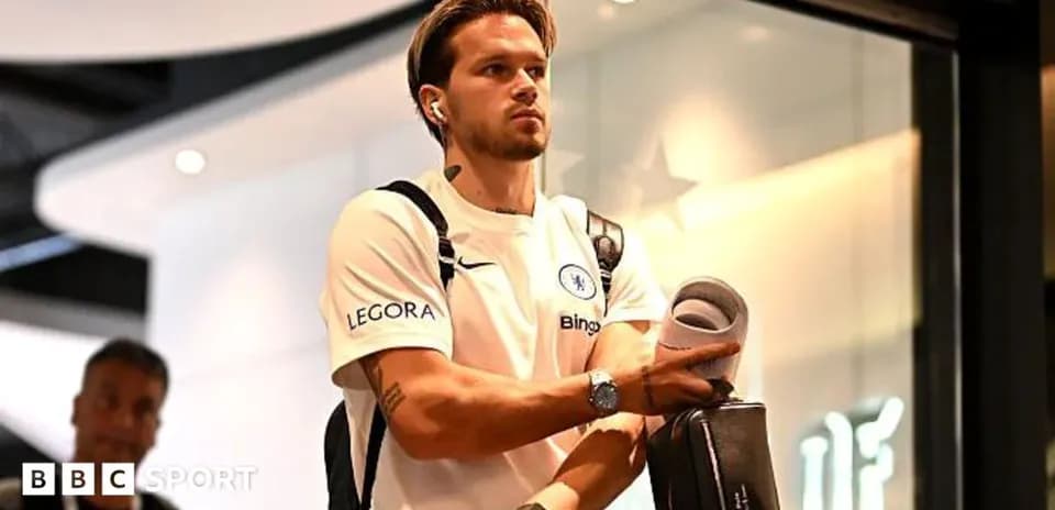 Player arriving at venue with headphones and bag