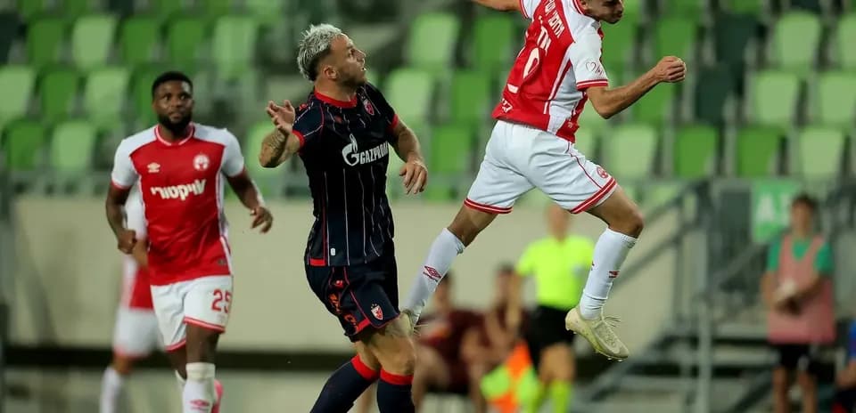 Crvena Zvezda player jumping for the ball