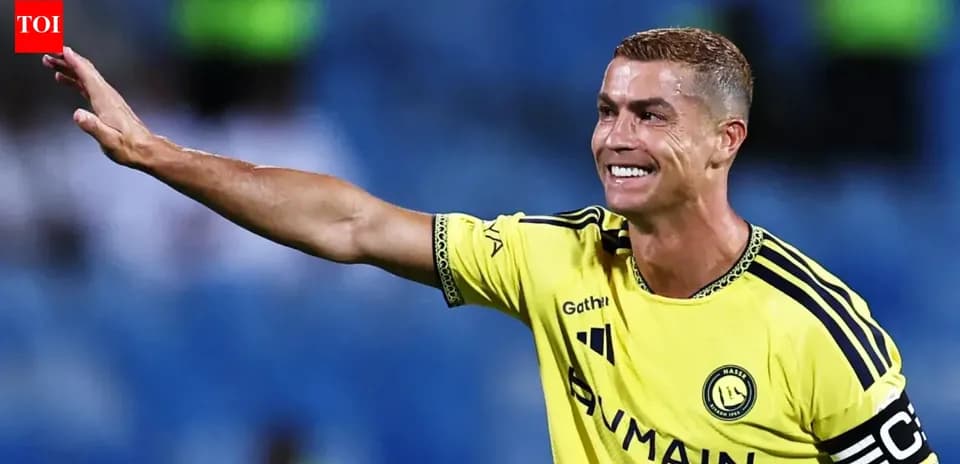 Player in yellow jersey waving to the crowd