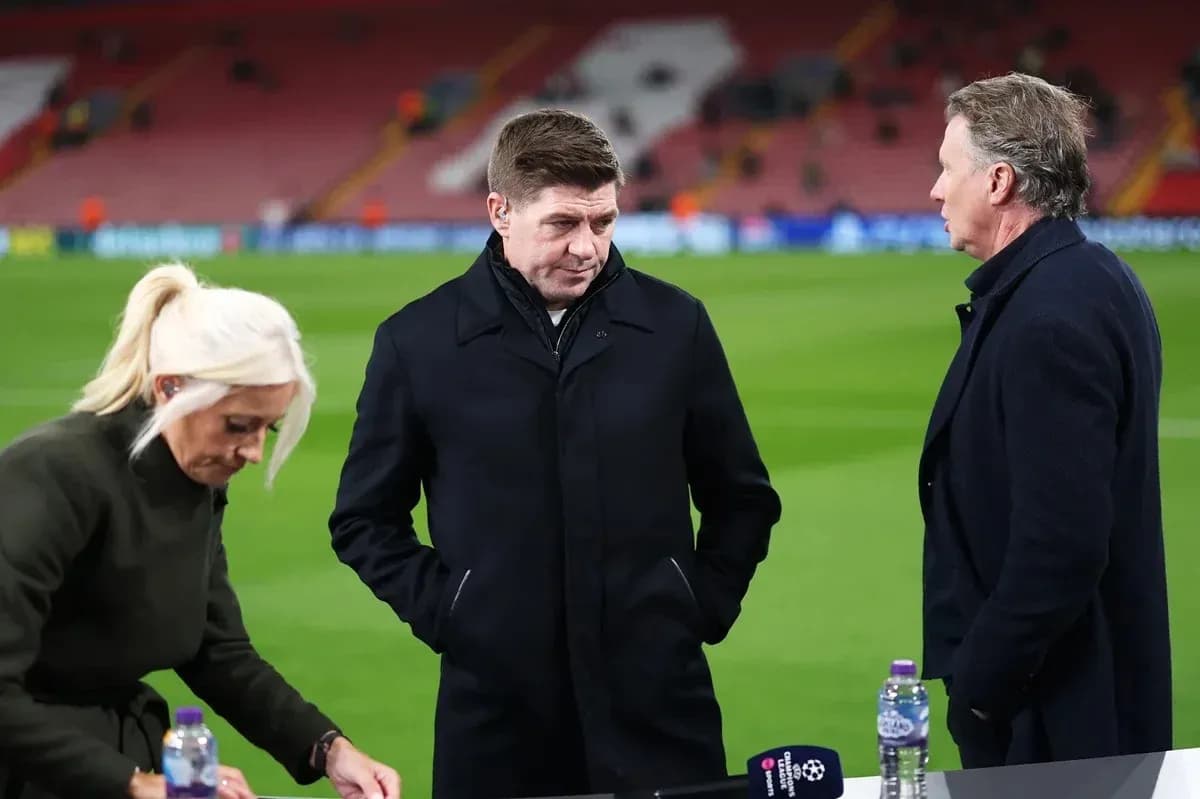 Three sports analysts discussing on the pitch