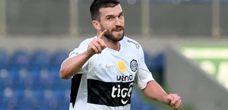 Player celebrating a goal on the field