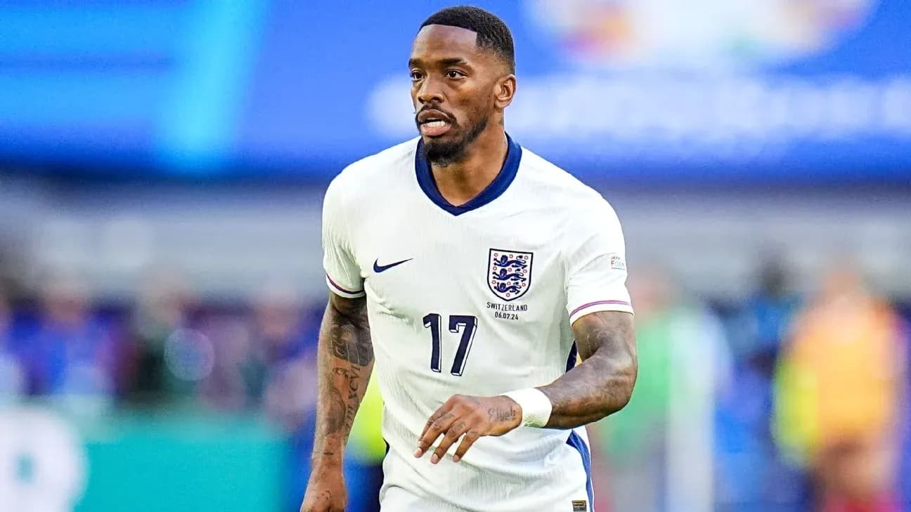 Player in England kit running on the pitch