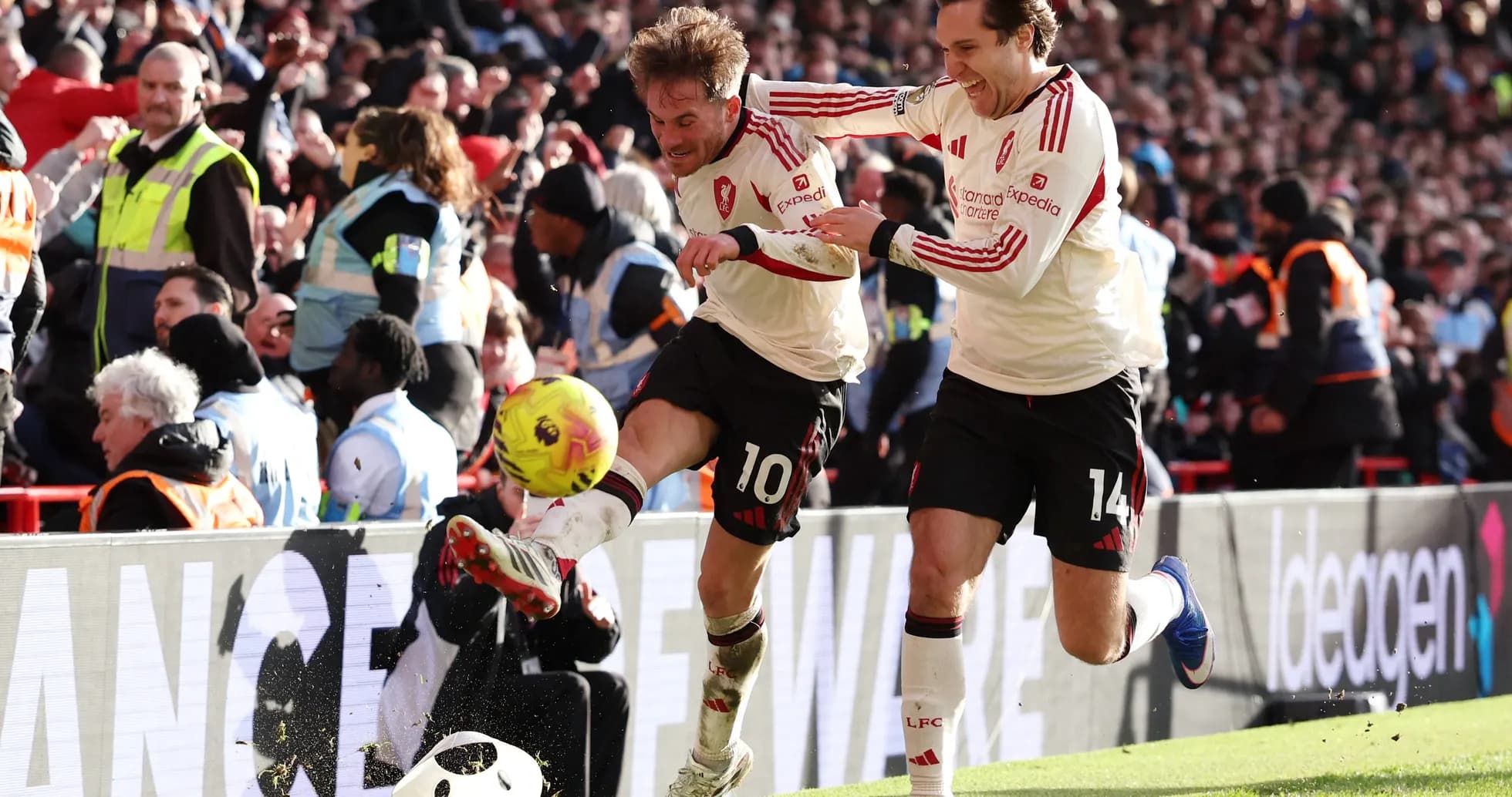 Players celebrating a goal during Liverpool match