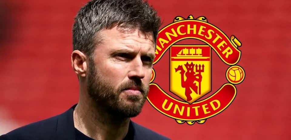 Coach in front of Manchester United logo background