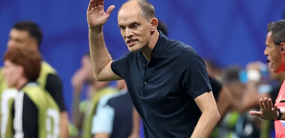 Coach directing players during a match