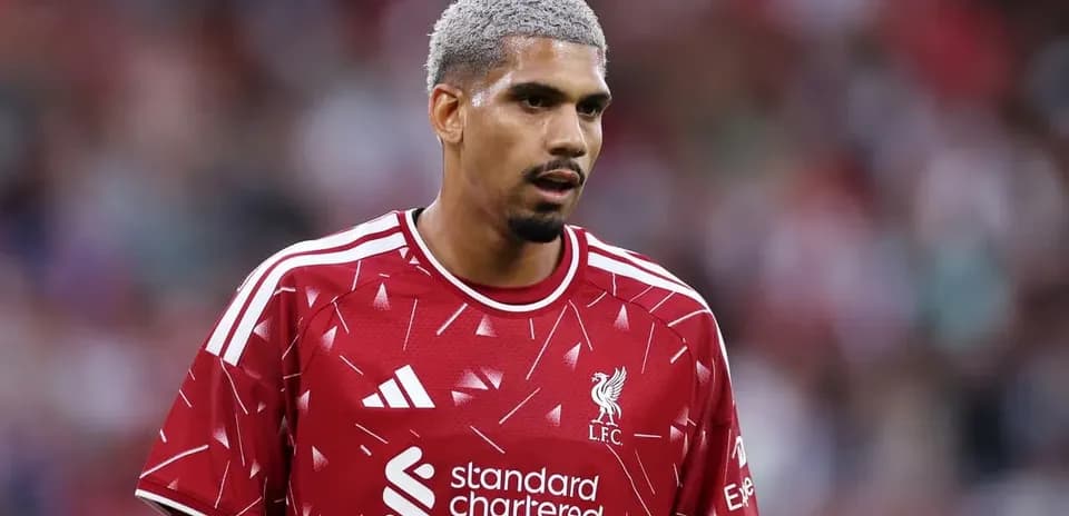 Player in Liverpool kit during match preparation