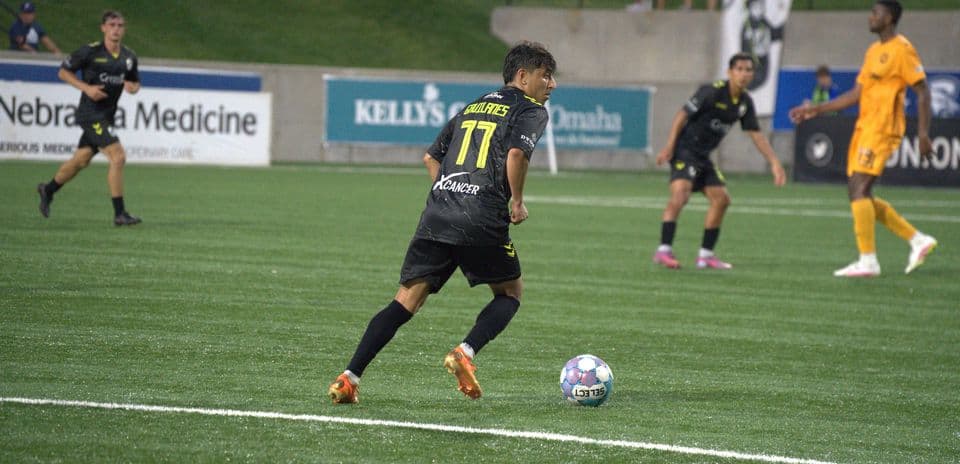Player dribbling the ball during match