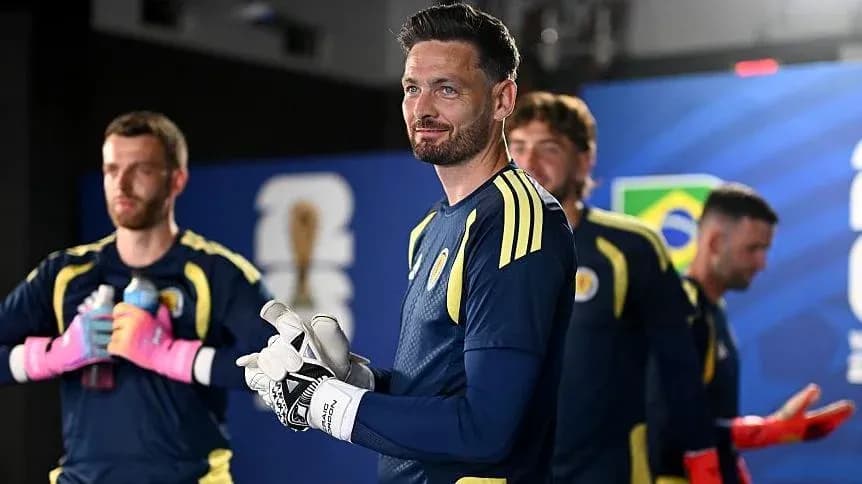 Goalkeeper and teammates preparing for match