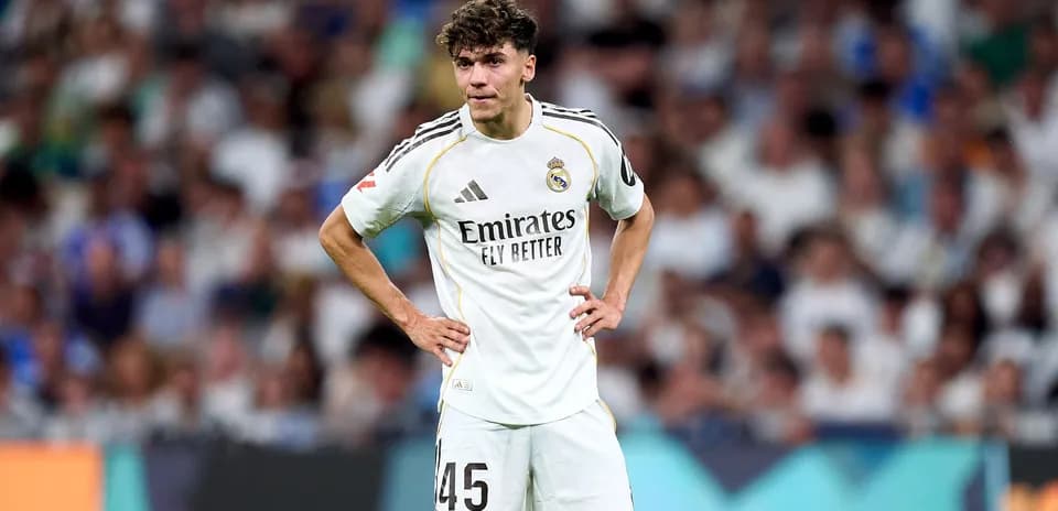 Player in Real Madrid kit on the field