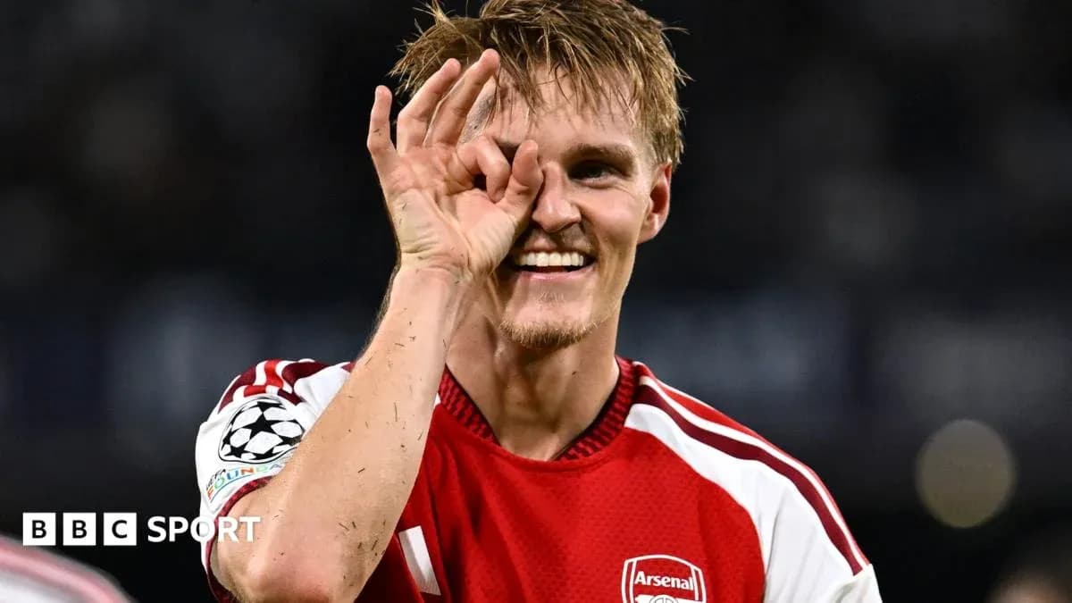 Player celebrating with a hand gesture on field