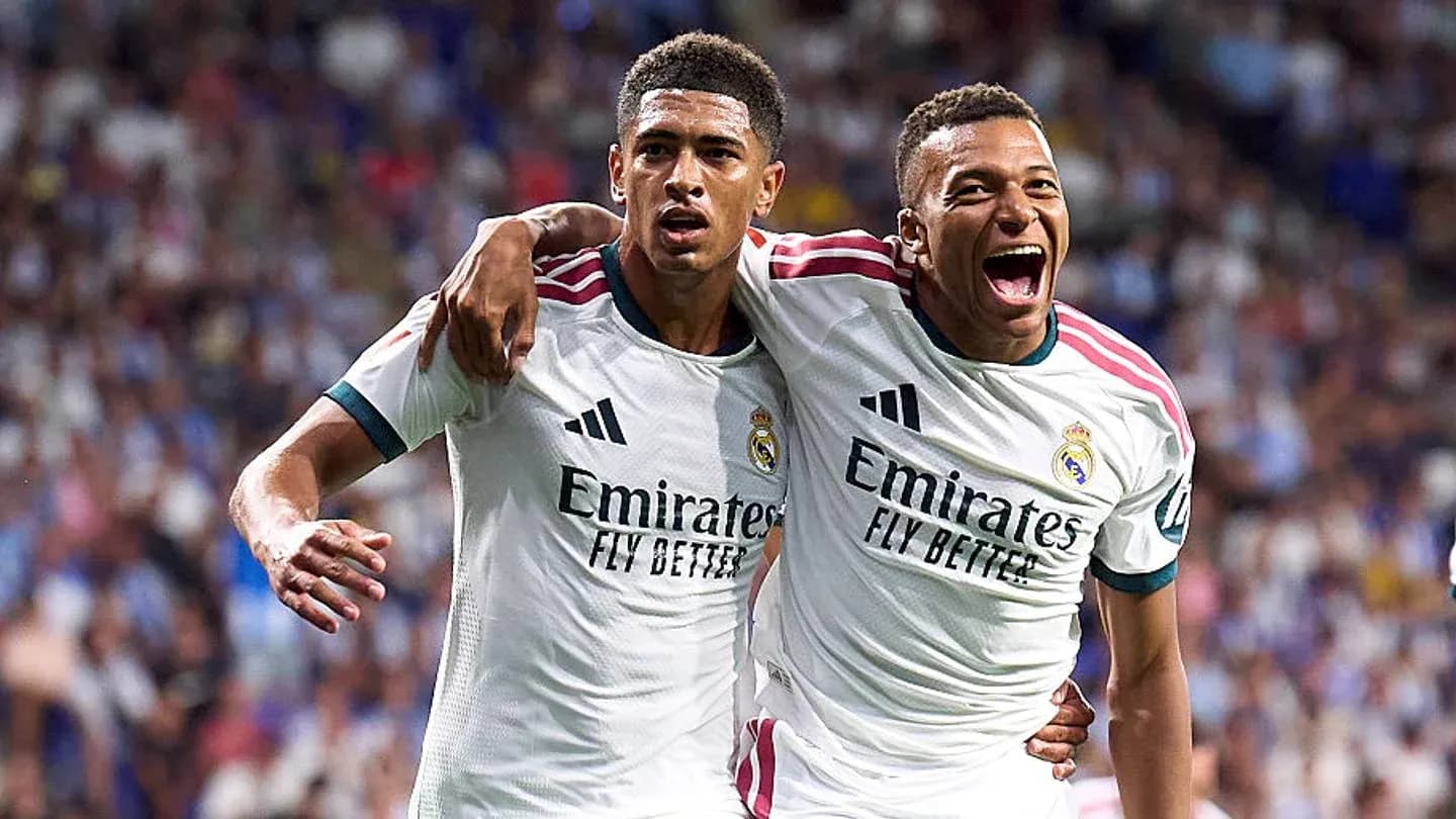 Two Real Madrid players celebrating a goal