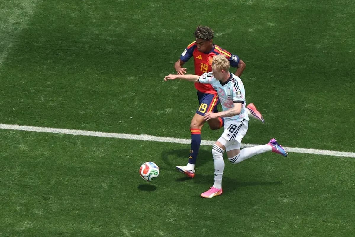 Two players contesting the ball during a match