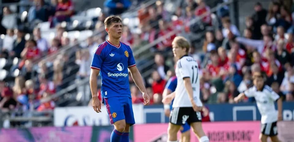 Player in Manchester United kit on the field